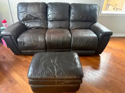 CLEARANCE SALE - leather reclining sofa with ottoman, View more