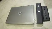 For parts/repair:  Dell laptop with docking station