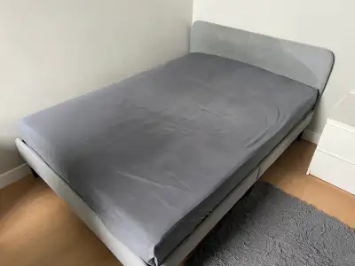 IKEA Queen Bed Frame +  HAUGESUND Spring Mattress — Movi, View more
