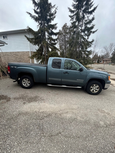 2010 GMC 1500 4 by 4 extended cab, short box