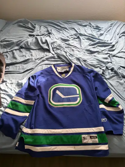 Alex Burrows Signed Stick in Rink Jersey, View more