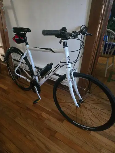 Selling a XL Opus Adagio hybrid bicycle. The bike drives smoothly, shifts cleanly, and has been kept...