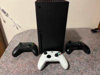 Xbox series X with box, 3 controllers, and 6 games