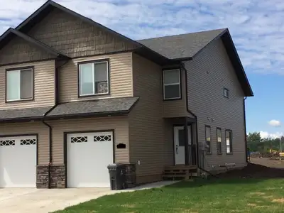 Executive Living in the Heart of Fort St. John – Garrison Landing......Experience upscale comfort an...