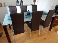 Excellent condition dining set o  6 leather chairs & glass table