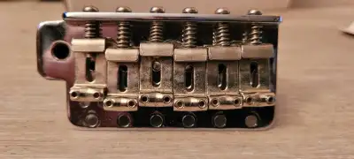 I have 2 Stratocaster bridges for sale. Pic one is from a 1998 Hurricane LTD3, comes with springs, S...