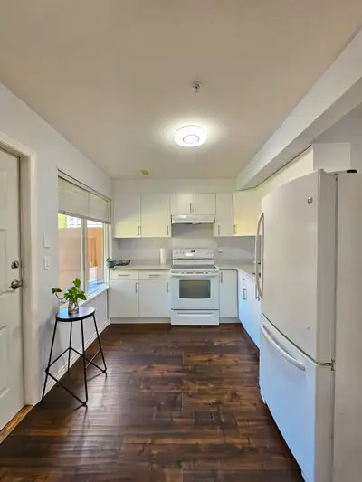 Beautiful furnished ground level 2 bedroom suite with private separate entrance, kitchen, full washr...