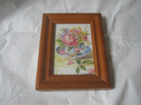 Wooden frame with Marjolein Bastin art