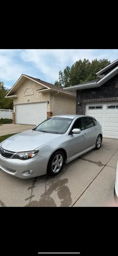 2008 5 speed manual Impreza, car is rebuilt status- have the paperwork showing passed inspection. Ow...