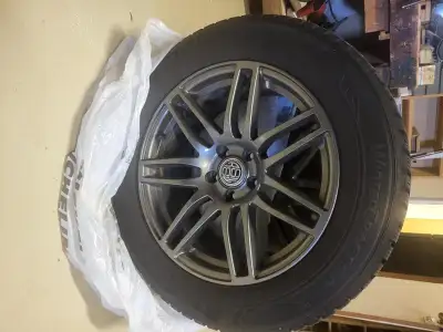 Winter tires on aluminum rims. Kumho Wintercraft tires on aluminum rims, used 1 season, Fits most Me...