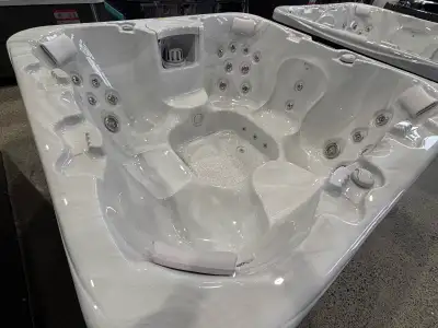 Arcadia model Seven seat spa Adjustable stainless steel jets Serenity fountain and LED lighting Trip...