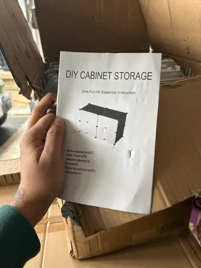 I have a DIY cabinet storage system for sale, still in its original packaging, though the box shows...