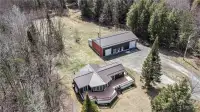 House with workshop on 22 wooded acres for sale in Plantagenet,