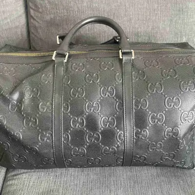 black Gucci duffel bag, View more