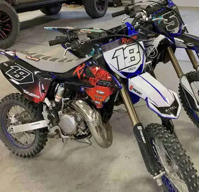 Two 85s 2022 Yz 85 regular wheel (the red bike) 2023 Yz 85 big wheel (the teal bike) both bikes have...