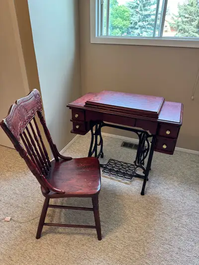 $125 OBO —- Singer Sewing Table & Chair, View more