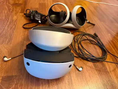 PSVR2 with controllers, charging station and a Game, View more