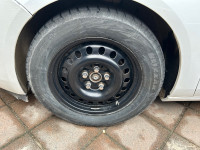 Bridgestone snow tires on rims