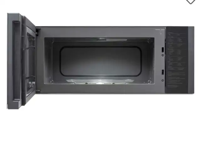 LG Over The Range Microwave  1.3 Cu Ft482653528402831361