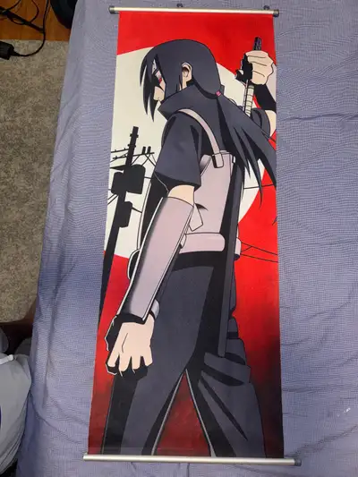 Hello, Selling this itachi wall art that I had received No tips or tears Held by sliding brackets 15...
