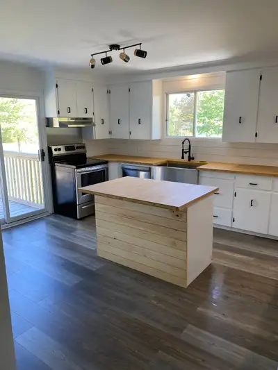 Lovely, bright and spacious clean3 bedroom 1 bathroom upper level apartment with big deck off of kit...