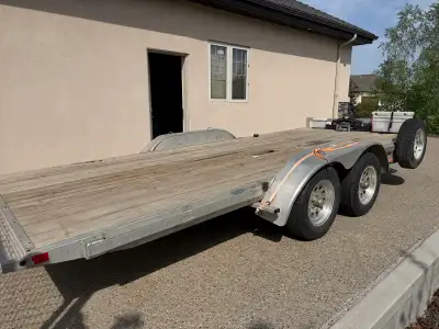 Aluminum Car Hauler – Full Tilt Deck Flat deck with a worn winch 18.2" deck length, 23.4" total leng...