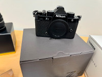 Nikon Zf camera body with accessories and 28mm F2.8 retro lens