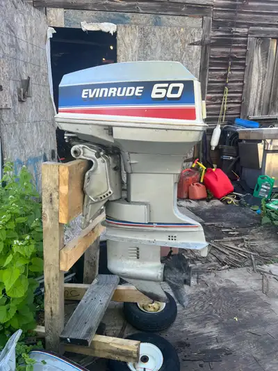 80s 60 horse Evinrude short shaft runs great Cables and controls with it