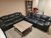 Matching black leather couches