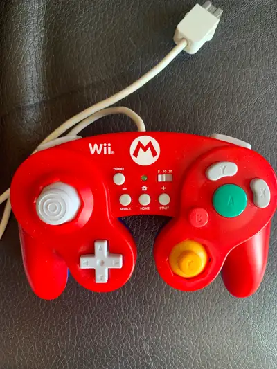 Enhance your gaming experience with this Hori Super Mario edition GameCube-style controller for the...