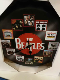 Wall clock 14" diameter with 'The Beatles' images desi