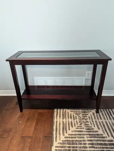 Espresso wood finish with glass centre console/entrance way table Dimensions: W 16" x H 30" x L 43"...