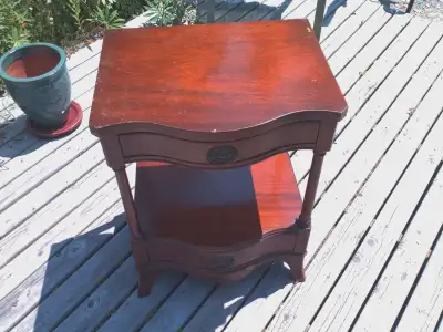 Antique solid wooden side table with 2 drawers for sale. Solid and sturdy. Has scratches and wear ma...