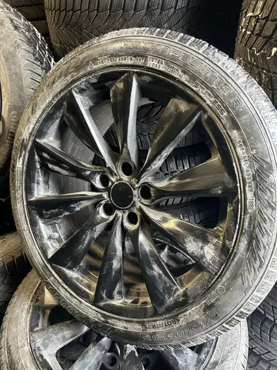 2023 tesla Model 3 18” rims with 235-45-18 nokian hakkappelitta R5 winter tires. In very good condit...