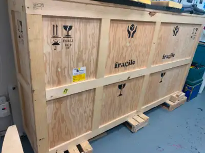 Large Superior constructed wooden shipping crate With pallet feet External size 101”W x 53”H x 21” D...