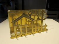 Brass wall-mount key and mail holder. Brand new.