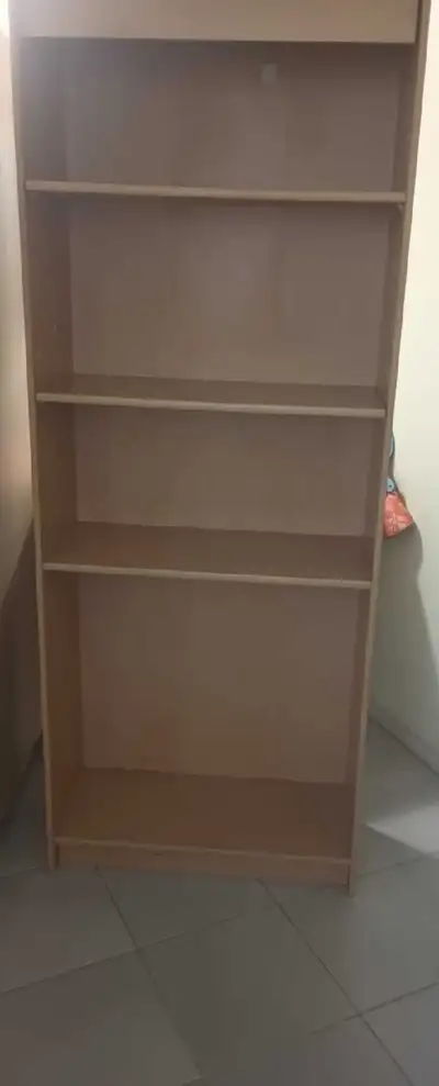 2 tall wooden bookcases, View more
