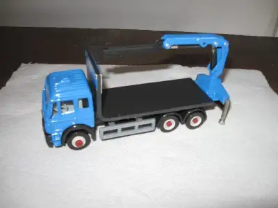FOR SALE About 1/64 scale Kenroc building materials Mercedes Benz flat deck truck.