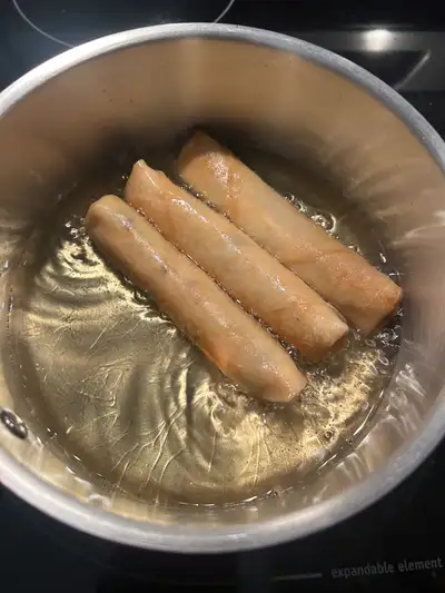 Affordable and locally source, frozen gourmet spring rolls for sale to the public. Deep frying food...