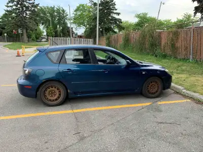 A 2008 Mazda 3 hatchback for sale. This car is in an smoothly drivable state with some few repairs t...