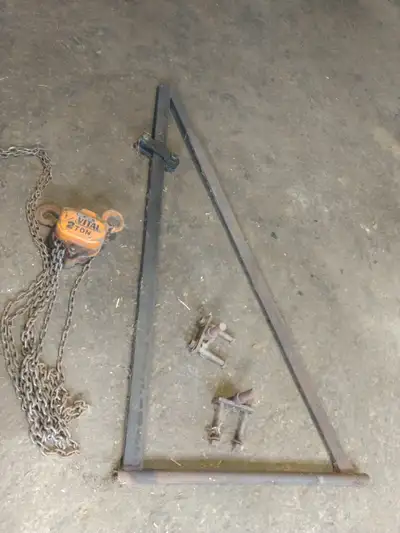 1/2 ton chain hoist on swivel steel "A" frame.Can be mounted on side of a building or post.Asking 30...