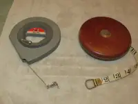 2 wind-up measure tapes. Both are 100 ft.  Good condition