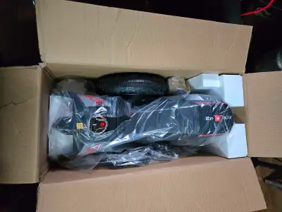 12Volt ride-on motorcycle,Aprilia. Brand new in box. I opened it just to check it out. Never been ou...