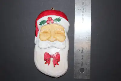 4 flat Santa Claus I hand carved from clear pine wood. A great addition to your Christmas ornaments...