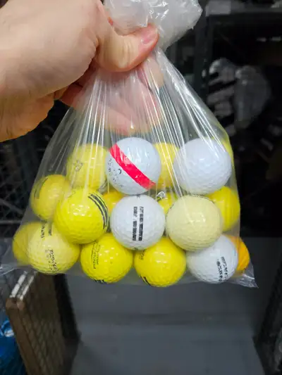 BAG OF ONLY SLIGHTLY USED GOLF BALLS, View more