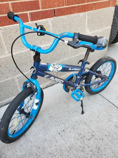 Selling a 16 inch Avigo Slapshot boys bike that needs a new back tire, otherwise this bike is in fai...