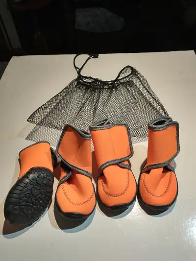 Brand new dog boots in size M., View more