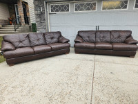 Free delivery/2 identical italian leather couches 