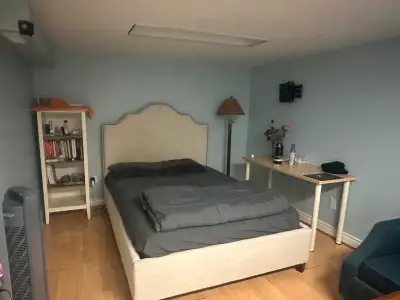 Two bedroom basement available , four males or  females .