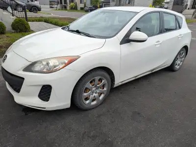 Mazda 3, 2013 fully functional with winter and summer tires included.